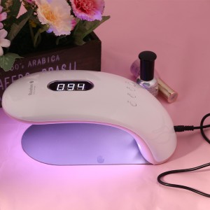 Η γυναίκα μπορεί να κρατήσει το μισό λάμπα της θεραπείας του ουρανού ουράνιο τόξο 2