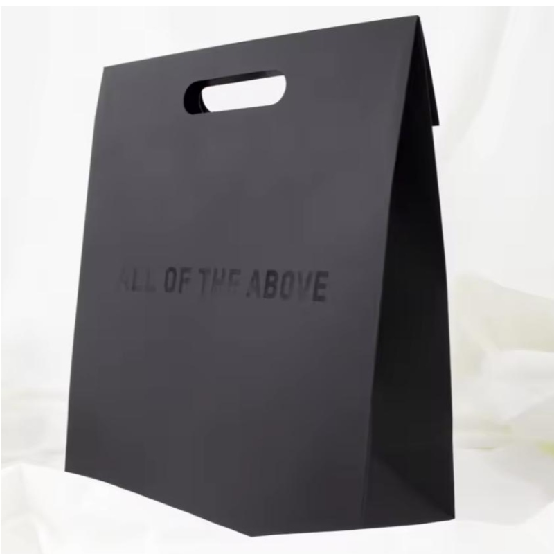 Πολυτελή λαβή-κοπή λαβή μαύρα ρούχα αγορές συσκευασία χάρτινο τσάντα κοσμήματα καλλυντικό προσαρμοσμένο λογότυπο σχεδιασμό χαρτί δώρο τσάντες