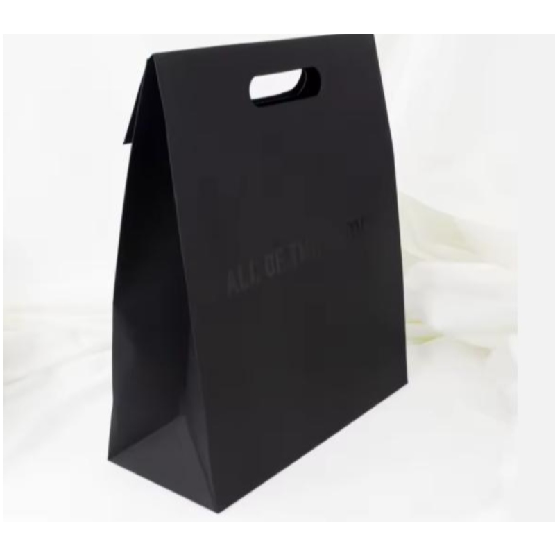Πολυτελή λαβή-κοπή λαβή μαύρα ρούχα αγορές συσκευασία χάρτινο τσάντα κοσμήματα καλλυντικό προσαρμοσμένο λογότυπο σχεδιασμό χαρτί δώρο τσάντες